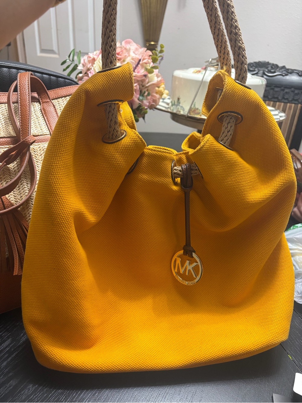 Michael Kors Yellow Canvas Drawstring Tote,great condition, but pen mark inside